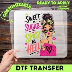 May include: A DTF transfer sheet featuring a graphic of a person with a messy bun, a neon green leopard print headband, and pink sunglasses with the text QUEEN VIBES. The text reads SWEET AS SUGAR... SPICY AS HELL in black, pink, and neon green.