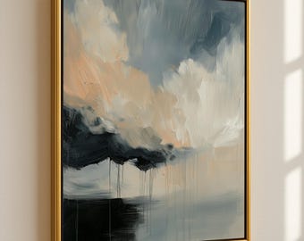 May include: Abstract art painting in a gold frame. The artwork features a cloudy sky with shades of white, gray, and peach. Darker, almost black, brushstrokes form the lower portion of the clouds, with vertical drips. The bottom of the painting is a dark gray.