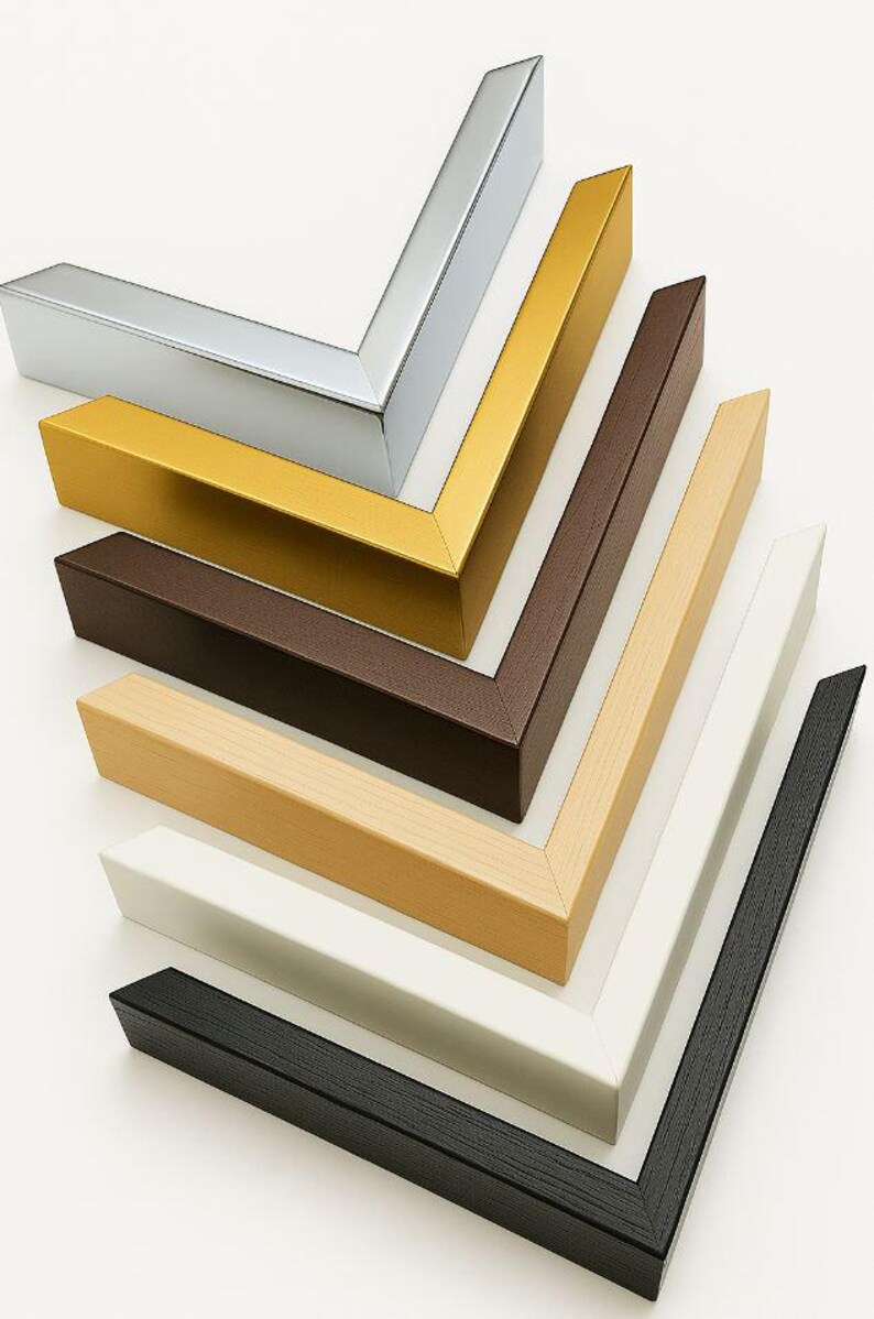 May include: A collection of picture frame corners in various colors, including silver, gold, brown, natural wood, white, and black. The frames are arranged in a diagonal pattern, showcasing their different finishes and styles.