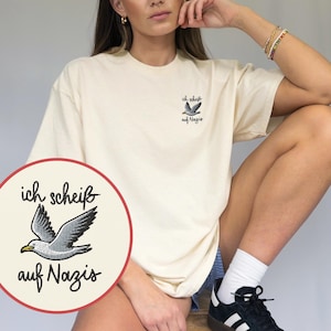 T-shirt brodé « Mouette contre les nazis » | T-shirt oversize unisexe contre les émeutes antifascistes d'extrême droite, contre le racisme et l'antifascisme (FCKNZS)