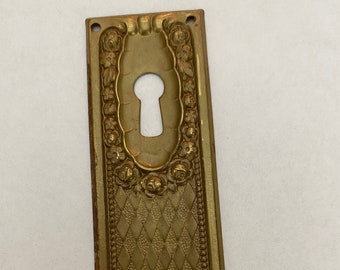 Vintage Stamped Brass Keyhole Escutcheon