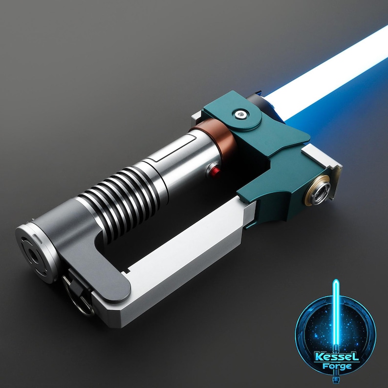 May include: A blue and silver lightsaber with a blue blade. The lightsaber has a textured grip and a silver handle. The blade is lit and extends from the handle. The lightsaber is a popular collectible for fans of the Star Wars franchise.