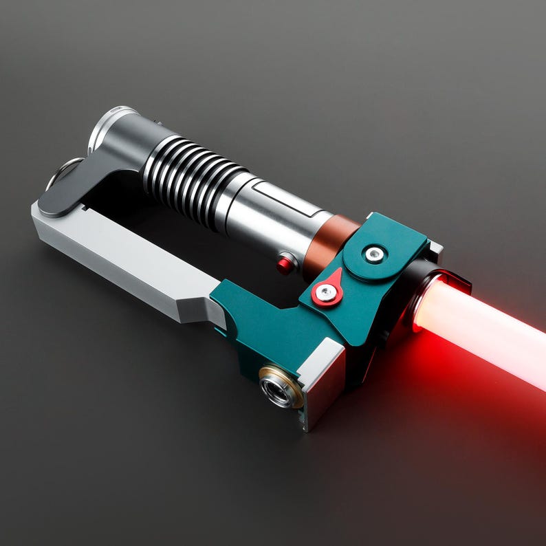 May include: A teal and silver lightsaber with a red blade. The lightsaber is attached to a teal and silver handle with a red button.