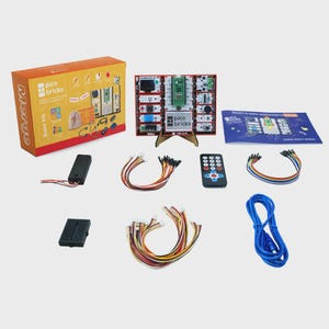 May include: An electronics base kit with a red and black circuit board, a remote control, and various colored wires. The kit includes a box with the text "pico bricks" and "Merge Base Kit".