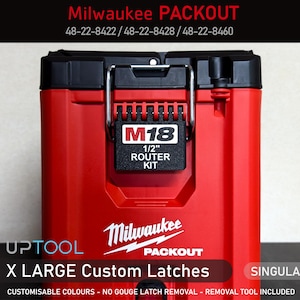 May include: A red Milwaukee PACKOUT toolbox with a black M18 1/2" Router Kit label. The box has a black handle and a black latch. The text "X LARGE Custom Latches" and "SINGULAR" are visible at the bottom of the image.