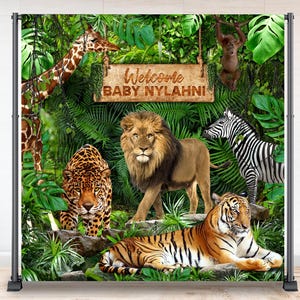May include: A jungle-themed backdrop featuring a giraffe, lion, jaguar, zebra, and tiger. The backdrop includes lush green foliage and a wooden sign that reads "Welcome Baby Nylahni."