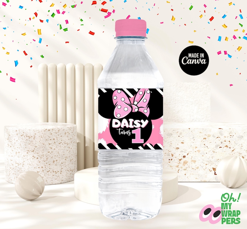 May include: A clear plastic water bottle with a pink and black label featuring a cartoon mouse with a pink bow and the text "Daisy turns 1".