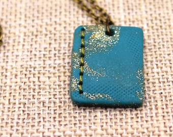 Polymer clay and silk thread pendant necklace