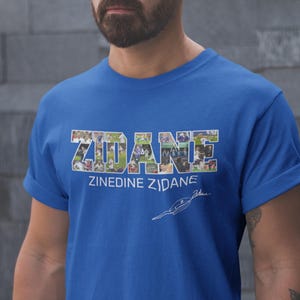 Zinedine Zidane Shirt, France Football Legend Tee, Real Madrid Soccer Jersey Fan T-Shirt, Gift for Football Lovers

Zinedine Zidane Vintage T-Shirt, World Cup 1998 Champion Shirt, Soccer Fan Apparel, Unisex Football Tee

Zidane France Jersey Fan Shirt, Real Madrid Legend Tee, Soccer Lover Gift, Unisex Football T-Shirt
Zinedine Zidane Football Shirt, France Icon Tee, Retro Soccer Fan Top, Unisex Sportswear Gift
Zidane Legend T-Shirt, France World Cup Winner Shirt, Real Madrid Football Fan Apparel
