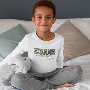 Zinedine Zidane Shirt, France Football Legend Tee, Real Madrid Soccer Jersey Fan T-Shirt, Gift for Football Lovers

Zinedine Zidane Vintage T-Shirt, World Cup 1998 Champion Shirt, Soccer Fan Apparel, Unisex Football Tee

Zidane France Jersey Fan Shirt, Real Madrid Legend Tee, Soccer Lover Gift, Unisex Football T-Shirt
Zinedine Zidane Football Shirt, France Icon Tee, Retro Soccer Fan Top, Unisex Sportswear Gift
Zidane Legend T-Shirt, France World Cup Winner Shirt, Real Madrid Football Fan Apparel