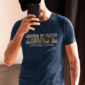 Zinedine Zidane Shirt, France Football Legend Tee, Real Madrid Soccer Jersey Fan T-Shirt, Gift for Football Lovers

Zinedine Zidane Vintage T-Shirt, World Cup 1998 Champion Shirt, Soccer Fan Apparel, Unisex Football Tee

Zidane France Jersey Fan Shirt, Real Madrid Legend Tee, Soccer Lover Gift, Unisex Football T-Shirt
Zinedine Zidane Football Shirt, France Icon Tee, Retro Soccer Fan Top, Unisex Sportswear Gift
Zidane Legend T-Shirt, France World Cup Winner Shirt, Real Madrid Football Fan Apparel