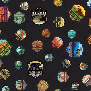 May include: A pattern of colorful national park patches on a dark gray background. The patches feature various parks like Yosemite, Grand Canyon, and Great Smoky Mountains. Each patch has unique illustrations and text, showcasing the park's name and location.