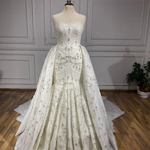 albanian wedding dress designer Anjeza Dyrmishi on Instagram: @anjezadyrmishi_photographer #dress @geraldina_sposa #mua @enilenahair_makeup #realbride @emelpeterci