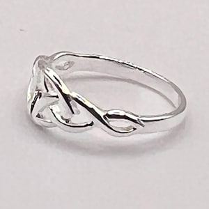 Petite Celtic Trinity Silver  Ring , free registered post worldwide. join our Celtic Community ,from Galway Ireland to you.