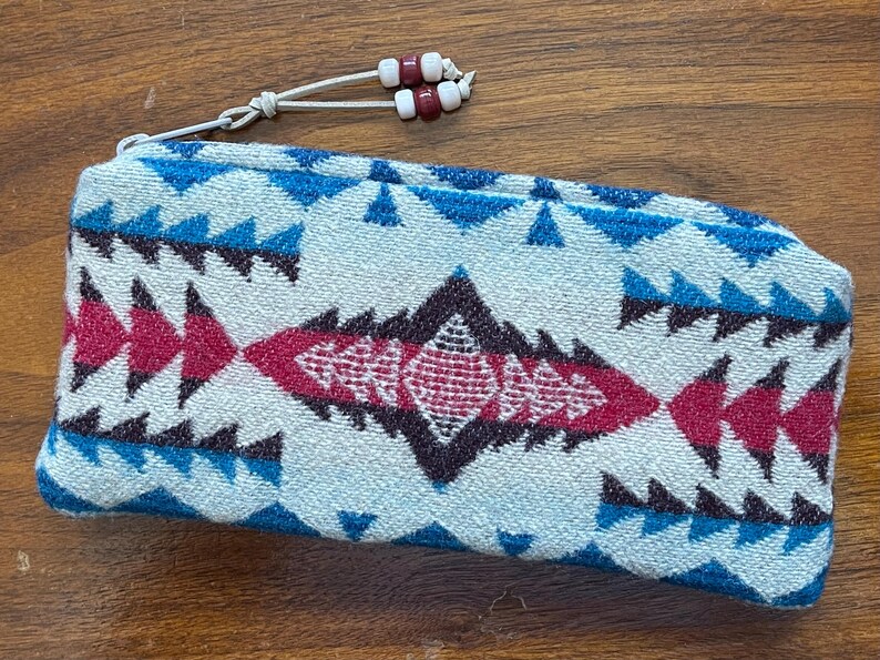 May include: A rustic wooden sign with the text "Welcome to our home" in a handwritten style. The sign features a distressed finish and a simple, inviting design, perfect for a front porch or entryway.