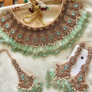 jewellery for mint green dress Mint green is a color that goes with almost all the color outfits , Do you agree ? , ., Check out our most beautiful collections of 4 beautiful mint green set , These necklaces are made of