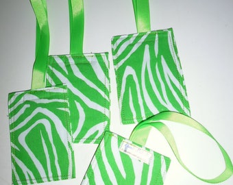 Green and white zebra-striped fabric luggage tag