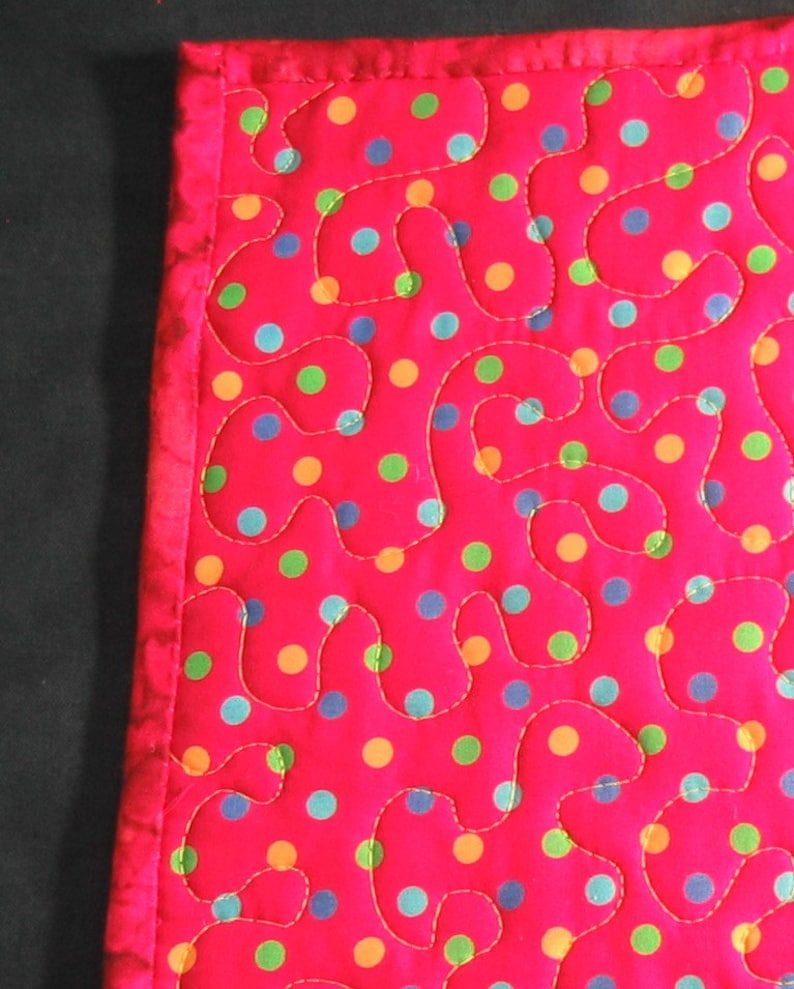Red and purple batik diamonds placemat