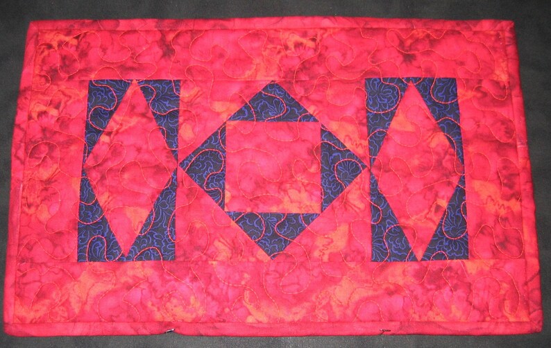 Red and purple batik diamonds placemat