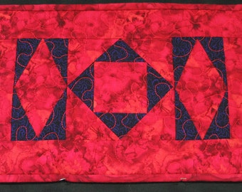 Red and purple batik diamonds placemat