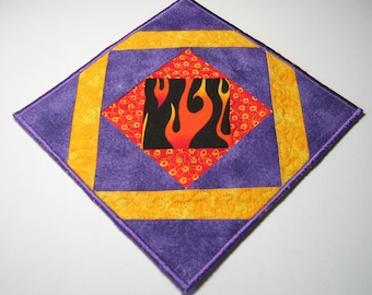 Purple fire plate mat (orange triangles)