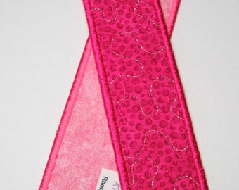Hot pink bookmark with silver highlights