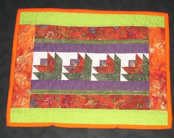 Orange, purple and lime green placemat