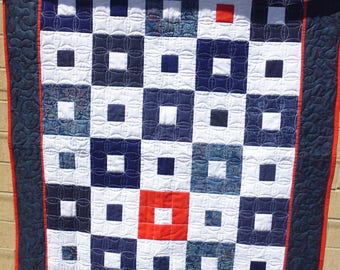 Red, white, and blue square-in-square crib or lap quilt