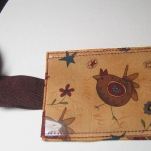 Tan chicken luggage tags