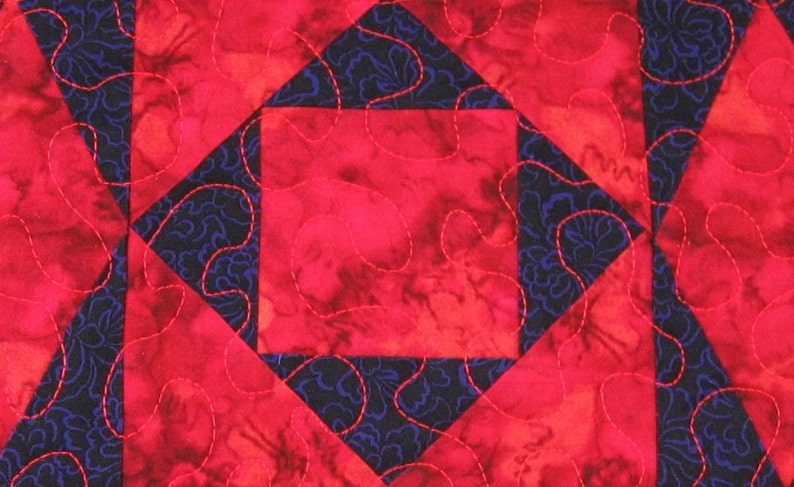 Red and purple batik diamonds placemat