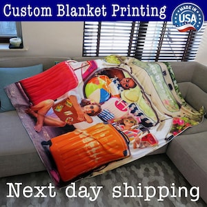 May include: A custom printed fleece blanket featuring a photo of people loading luggage into a car. The blanket is on a couch with a gray and white patterned rug underneath. The blanket is made in the USA.