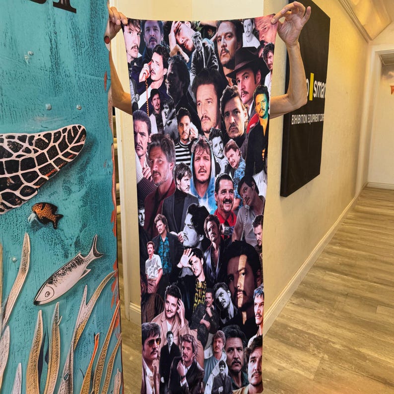Custom Body Pillowcase a man holding up a large poster of a bunch of people