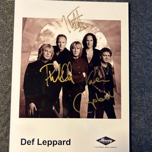 Def Leppard Autographed 5x7 Black & White Photo