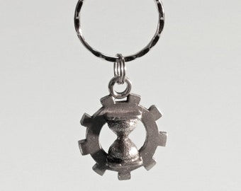 Time Travel Aid key chain - the industrial gear and the time travel hourglass are iconic symbols of SteamPunk style