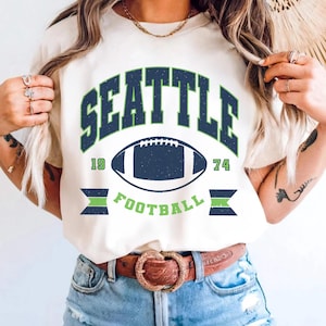 Seattle voetbal vintage stijl comfort kleuren shirt, Seattle voetbal shirt ronde hals Seattle T-shirt, retro oversized voetbalshirt Seattle