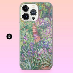 May include: A phone case with a painting of a garden path lined with purple irises. The case is clear and shows the phone's camera lenses.