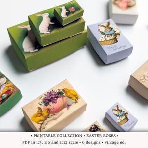 May include: A collection of vintage-style Easter boxes in various sizes. The boxes feature illustrations of bunnies, chicks, and children. The color palette includes green, lavender, and beige. The boxes are arranged on a white surface.