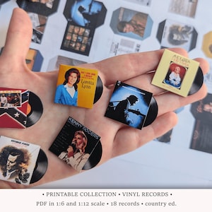 Könnte beinhalten: Miniatur-Vinyl-Schallplattensammlung mit Albumcovern von Country-Musik-Künstlern. Die Schallplatten sind schwarz mit farbenfrohen Albumcovern, darunter Bilder von Loretta Lynn und Kenny Rogers. Der Text "PRINTABLE COLLECTION VINYL RECORDS" ist sichtbar.