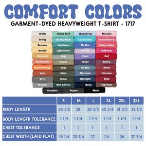 May include: A display of folded Comfort Colors garment-dyed heavyweight t-shirts in various colors, including white, black, and navy. The image also includes a size chart with measurements for body length and chest width in inches.
