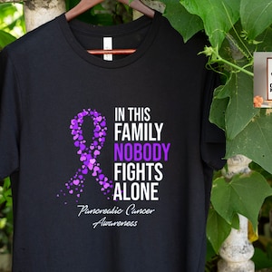 In This Family Nobody Fights Alone shirt