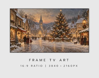 May include: Digital artwork for a frame TV featuring a snowy village square at dusk with a large illuminated Christmas tree, stone buildings, a church spire, and people walking. The text reads FRAME TV ART 16:9 RATIO 3840 x 2160 PX.