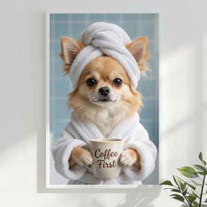 May include: A framed print featuring a Chihuahua wearing a white robe and towel, holding a mug that says "Coffee First." The dog has tan and white fur and is set against a light blue tiled background.