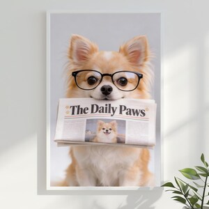 May include: A framed print featuring a light brown Chihuahua wearing black-rimmed glasses and holding a newspaper titled "The Daily Paws." The newspaper displays a photo of the same dog. The dog is the focal point.