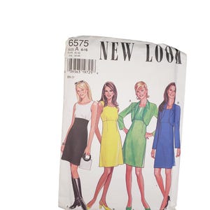 May include: A New Look sewing pattern packet, featuring illustrations of four different dress designs. The packet is white with the text "NEW LOOK" and the number "6575". The size range is 6-16.