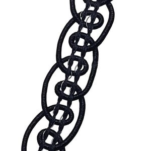 May include: A black, woven chain-like accessory. The design features interconnected oval shapes, creating a textured, linked pattern. The accessory is set against a plain white background, highlighting its dark color and intricate details. This item could be used as a necklace or other jewelry.