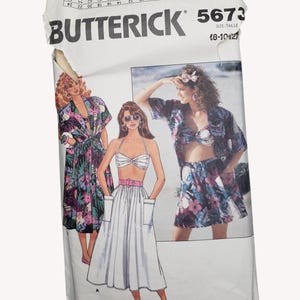May include: A vintage Butterick sewing pattern, number 5673, featuring illustrations of women's summer outfits. The pattern includes a skirt, top, and cover-up with floral prints. The package is white with text and size information.