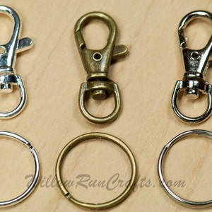 May include: Six metal key rings, three silver and three bronze. Each set includes a swivel clasp and a jump ring.