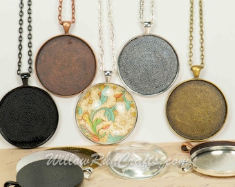 May include: Assortment of round pendant trays with different finishes, including black, copper, silver, and gold. The trays are shown with chains and a glass dome.