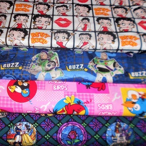 Character Fabrics #23 Betty Boop, Buzz Lightyear, Angry Birds, Beauty & the Beast, Sold INDIVIDUALLY not as a group, by the Half Yard