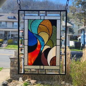 May include: A weathered wooden sign displaying the word "Welcome" in white. The sign has a distressed appearance, suggesting a rustic aesthetic, and is suitable for a porch or entrance.